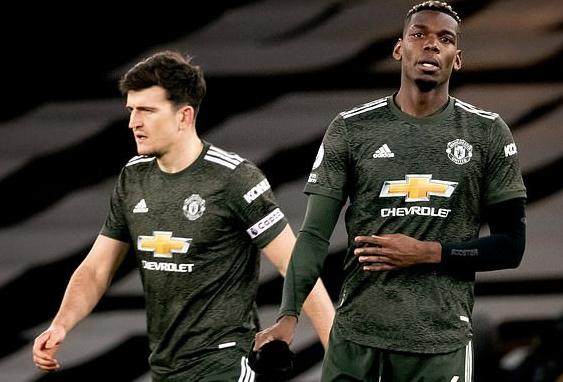 1612088332416024534.jpg 38679742-9205655-Harry_Maguire_left_and_Paul_Pogba_right_react_after_dropping_poi-a-13_1612044539418.jpg